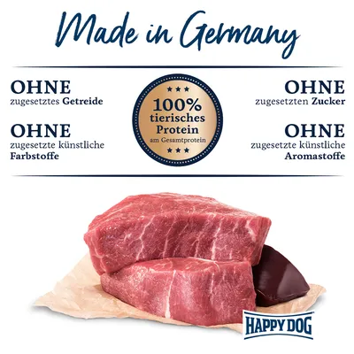 Made in Germany. Ohne zugesetztes Getreide, Zucker, künstliche Farbstoffe und Aromastoffe. 100% tierisches Protein am Gesamtprotein. Happy Dog Logo sichtbar.