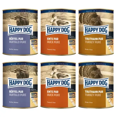 Happy Dog konzervválogatás: Büffel Pur, Ente Pur, Truthahn Pur. 100% tierisches Protein, Made in Germany feliratok láthatók a címkéken.