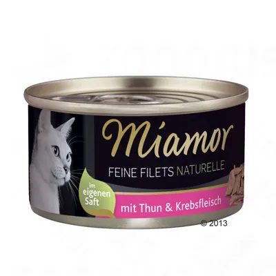 Boîte Miamor Feine Filets Naturelle, texte en allemand : im eigenen Saft, mit Thun & Krebsfleisch. Image d’un chat blanc sur l’étiquette.