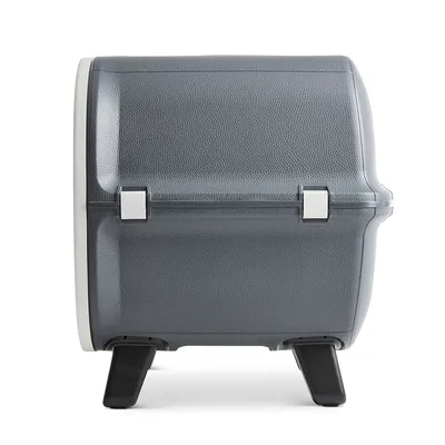 Grey transport box with two locks and sturdy black feet, suitable for pet transport.