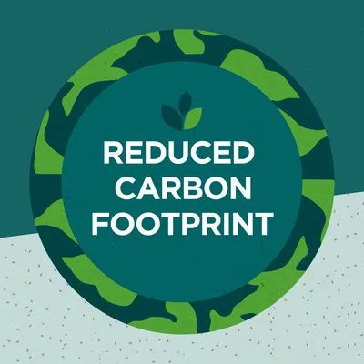 REUCED CARBON FOOTPRINT (engelsk tekst) med blad-ikon i cirkel, indikerer reduceret CO2-aftryk. Teksten er kun på billedet.