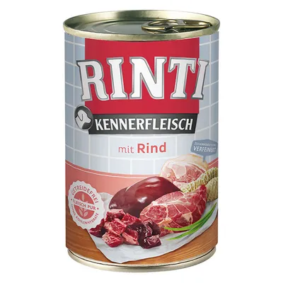 Scatola di cibo per cani Rinti Kennerfleisch mit Rind, con immagini di carne bovina. Testo visibile: 'Getreidefrei', 'Fleisch pur', 'Zusammensetzung verfeinert'.