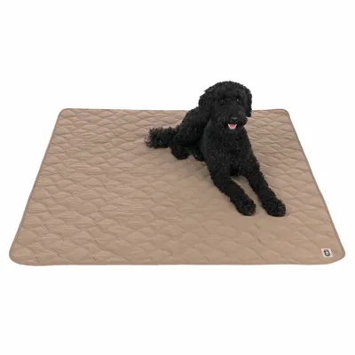 Brown, quilted dog blanket with a black dog lying on it. Rectangular shape and visible brand logo in the corner.