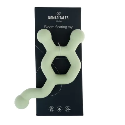 Nomad Tales München Bloom flydende legetøj, svømmelegetøj i lysegrønt design. Emballagen viser symboler for sikkerhed, kærlighed og vandbestandighed.