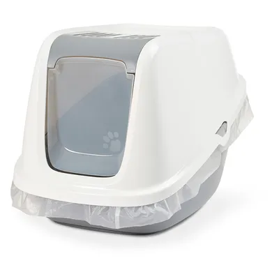 Geschlossene Katzentoilette mit grauer Klappe und Pfotenmotiv, weissem Gehäuse und Schutzfolie am Rand.