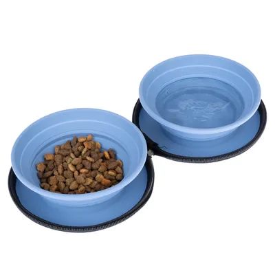 Due ciotole pieghevoli blu, una con cibo secco e una con acqua, collegate da una base nera con cerniera.
