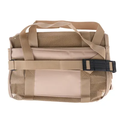 Sac de transport beige en tissu et maille, avec poignées et sangle réglable, fermeture zippée visible sur le dessus, boucle plastique noire sur le côté.