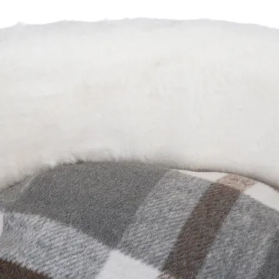 Close-up of a grey and white checked fabric with a soft white plush surface.