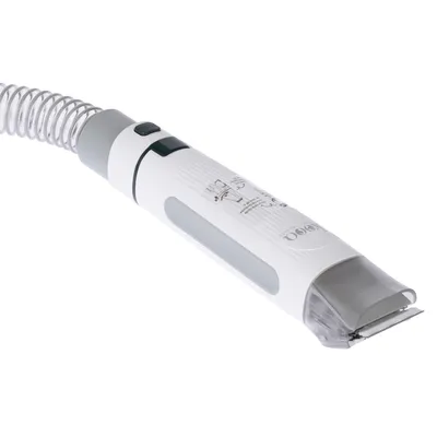 White electric pet hair trimmer with rounded handle and visible blade, suitable for precise trimming.