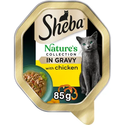 Sheba Nature's Collection in Gravy with chicken, 85g. Image shows food pieces in gravy and product weight.