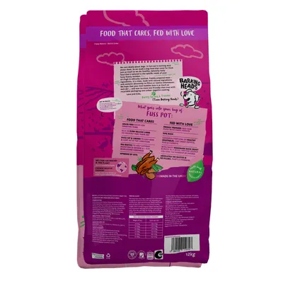 Back of pet food bag showing feeding information, key features such as grain-free recipe, high duck content, no artificial nasties, and nutritional details. Weight: 12kg.