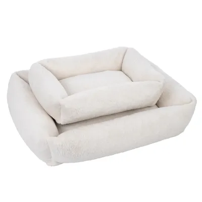 Two rectangular, white plush beds in different sizes, stacked on top of each other.