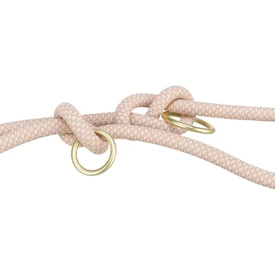 Rosa geflochtenes Seil mit goldfarbenen Metallringen, geeignet für Befestigungen oder Zubehör.
