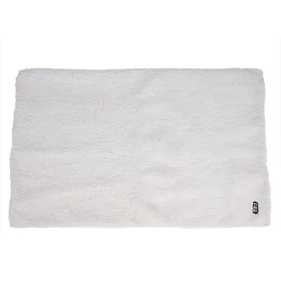 White, rectangular dog blanket with a fluffy surface and Trixie logo in the corner.