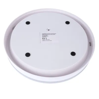 Round white base with CE marking and manufacturer information, suitable for Zooplus products. Visible black rubber feet for stabilisation.
