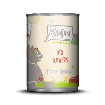 MjAMjAM Bio wieprzowina, naturalnie smaczna, bez zbóż, dużo mięsa. Ilustracja kota z wiankiem kwiatowym na łące. Wyprodukowano w Niemczech.