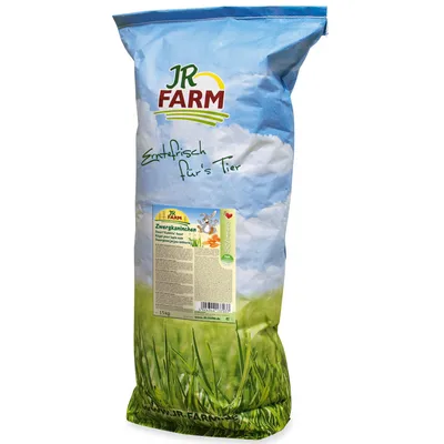JR Farm Erntefrisch für's Tier, förpackning med texten Zwergkaninchen och vikt 15 kg synlig på etiketten. Bild på kanin och grönsaker på etiketten.