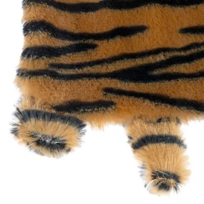 Plys materiale med tigerstribe-mønster, brun og sort, detaljevisning af overfladen.