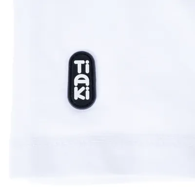 Tiaki-Logo auf weissem Stoff.