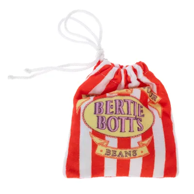 Bolsa de tela a rayas rojas y blancas con la inscripción 'Bertie Bott's Beans' en lila y amarillo. Cordón blanco visible.