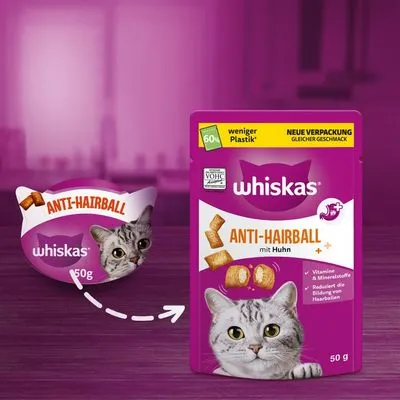 Whiskas Anti-Hairball met kip, 50 g. Nieuwe verpakking met 60% minder plastic, zelfde smaak. Bevat vitaminen en mineralen, vermindert haarbalvorming. Kattenkop op de verpakking zichtbaar.