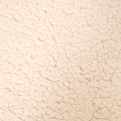 Nahaufnahme einer cremefarbenen, flauschigen Stoffoberfläche. Materialstruktur deutlich sichtbar. Nahaufnahme einer cremefarbenen, flauschigen Stoffoberfläche. Materialstruktur deutlich sichtbar.