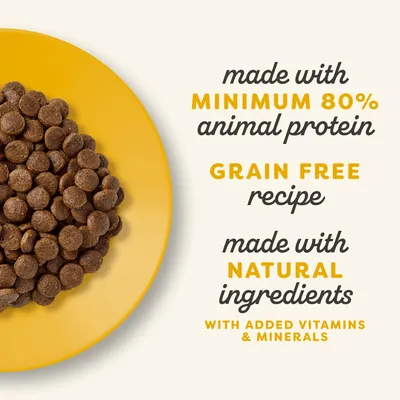 Kibble shown on plate with text: made with minimum 80% animal protein, grain free recipe, made with natural ingredients, with added vitamins and minerals.
