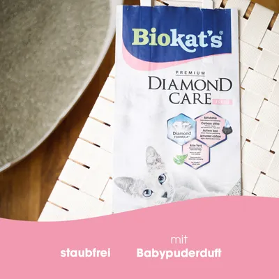 Biokat's Premium Diamond Care Fresh Katzenstreu, staubfrei mit Babypuderduft, enthält Aktivkohle und Aloe Vera.