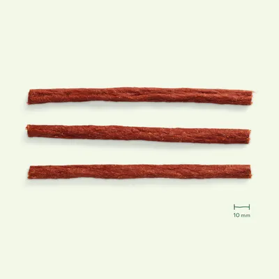 Three stick-shaped treats shown with a scale indicating 10 mm thickness, illustrating product size and shape.