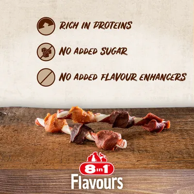 8in1 Flavours. Rich in proteins, no added sugar, no added flavour enhancers. Two twisted dog chews with brown and orange coating on wooden surface.