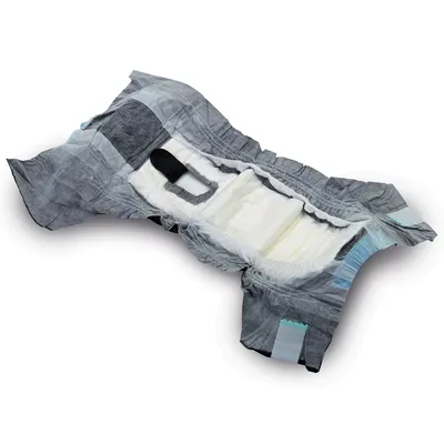 Opened dog nappy with elastic sides, absorbent core and hole for the tail. Shows structure and materials of the nappy.
