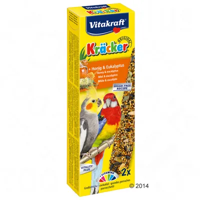 Vitakraft Kräcker dla papug, miód i eukaliptus, 2 sztuki, receptura bez cukru, widoczne zdjęcia papugi nimfy i rozelli, oznaczenie VITAMINE PLUS.