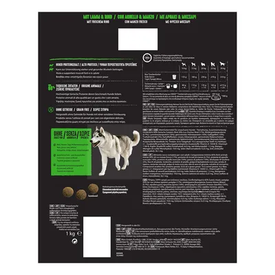 Dog food packaging back with feeding guide by dog weight, visible text: 'Grain free', 'Ohne/Senza/Χωρίς', 1 kg, image of a husky, three kibble pieces, multiple languages.