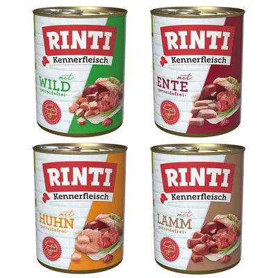 RINTI Kennerfleisch lattine: con selvaggina, anatra, pollo e agnello. Senza cereali. Pezzi di carne visibili e ingredienti sulla confezione.