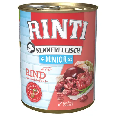 RINTI Kennerfleisch Junior med Rind, getreidefrei. Billede af oksekød og indmad på dåsen. Tekst: Reich an Omega3, Rinti seit 1983 Original.
