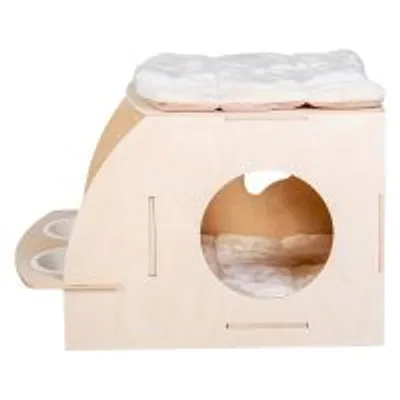 Cuccia in legno chiaro con ingresso circolare, cuscino imbottito sopra e all'interno, due ciotole laterali integrate. Materiale visibile: legno e tessuto.