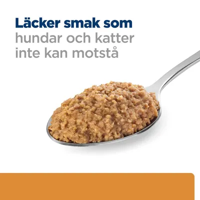 Läcker smak som hundar och katter inte kan motstå. Sked med brun patéliknande våtfoder.