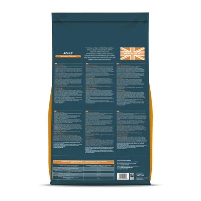 Back of pet food bag showing feeding guide, nutritional information, ingredients list, and a label stating 'Made in the UK'.