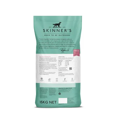 Skinner's Born to be Outdoors 15kg pack with feeding guide, storage instructions, recyclable packaging info and product description visible on the back.