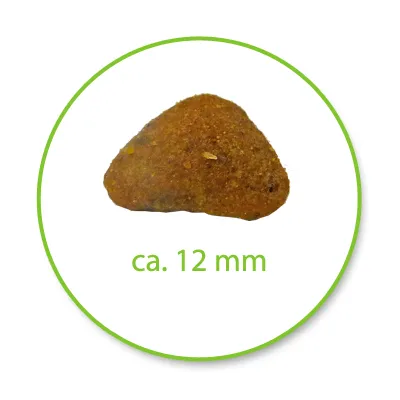 Едно парче суха храна с приблизителен размер 12 мм, показано в кръгла рамка с надпис „ca. 12 mm“ отдолу.