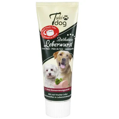 Tubi Dog Delikatess Leberwurst, paté di fegato in tubetto. Testo visibile: Ohne Konservierungsstoffe, Mit viel frischer Leber, Soft Touch-Tube, Schnell zu öffnen. Immagine di due cani.