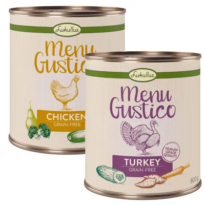 Dos latas de comida Lukullus Menu Gustico: una con texto 'Chicken Grain-Free' y dibujos de pollo, pera, brócoli y calabacín; otra con 'Turkey Grain-Free', pavo, pepino y boniato, 800 g.