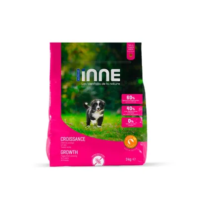 Sac INNE Croissance Growth 3 kg, 60% ingrediente origine animală, 40% fructe și legume, 0% cereale, pui. Text în franceză și engleză vizibil pe ambalaj.
