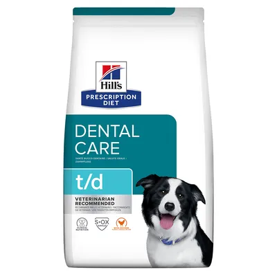 Hill's Prescription Diet Dental Care t/d hondenvoer, tekst: 'Veterinarian Recommended', afbeelding van een hond op de verpakking. Zichtbare iconen: Clinical Nutrition, S+OX Shield, Hill's VET Essentials.