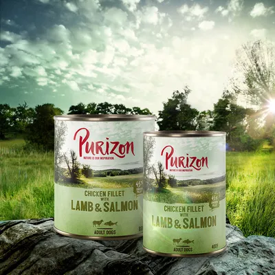 Due lattine di Purizon Chicken Fillet with Lamb & Salmon per cani adulti, 800 g e 400 g, visibili su sfondo naturale. Testo: 'Nature is our inspiration', '45% chicken fillet'.