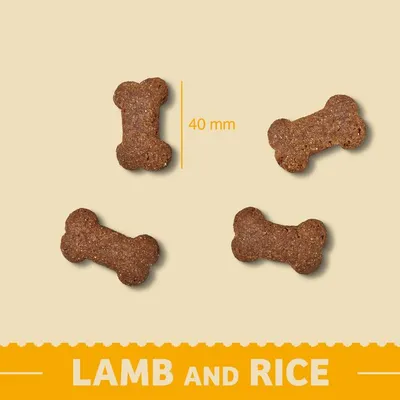 Bone-shaped treats with lamb and rice, each measuring 40 mm in length, shown against a plain background.