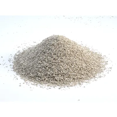 Pile of fine, grey granules on a white background. Product image for litter or similar material.