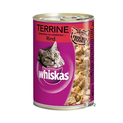 Puszka Whiskas Terrine Rind, widoczny napis: 'Zubereitet mit köstlichem... Rind', grafika kota i kawałki mięsa. Oznaczenie: 'Frischem Fleisch'.