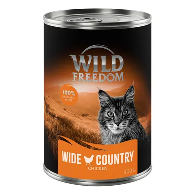 Wild Freedom Wide Country Chicken, ricetta 100% senza cereali, lattina da 400g con design paesaggistico e immagine di gatto.