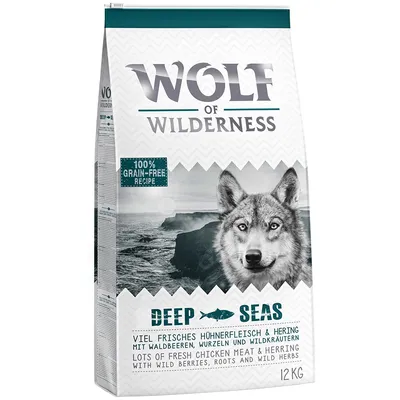 Ambalaj Wolf of Wilderness Deep Seas, 12 kg, 100% grain-free recipe, cu carne proaspătă de pui și hering, fructe de pădure, rădăcini și ierburi sălbatice. Text în germană și engleză.